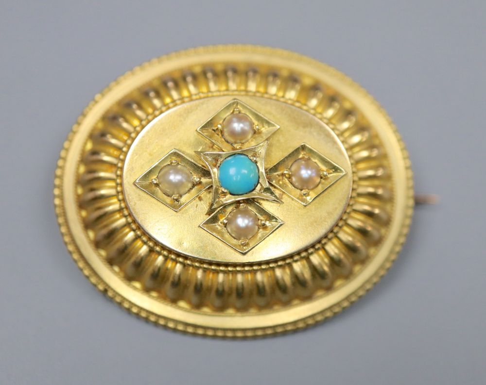 A Victorian yellow metal, turquoise and split pearl set oval brooch, 35mm, gross 7.9 grams.